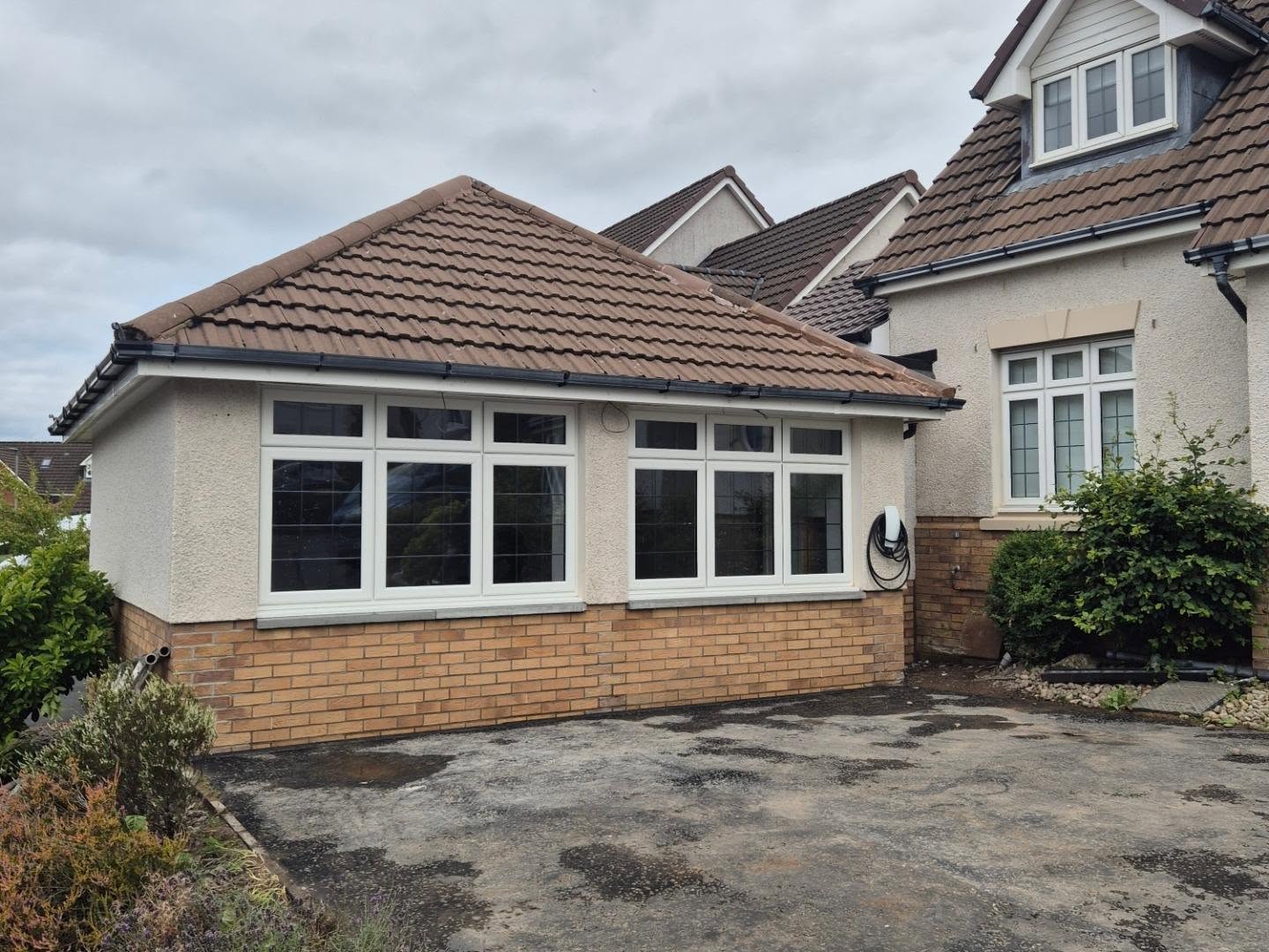 Double garage and extension joined to the main house