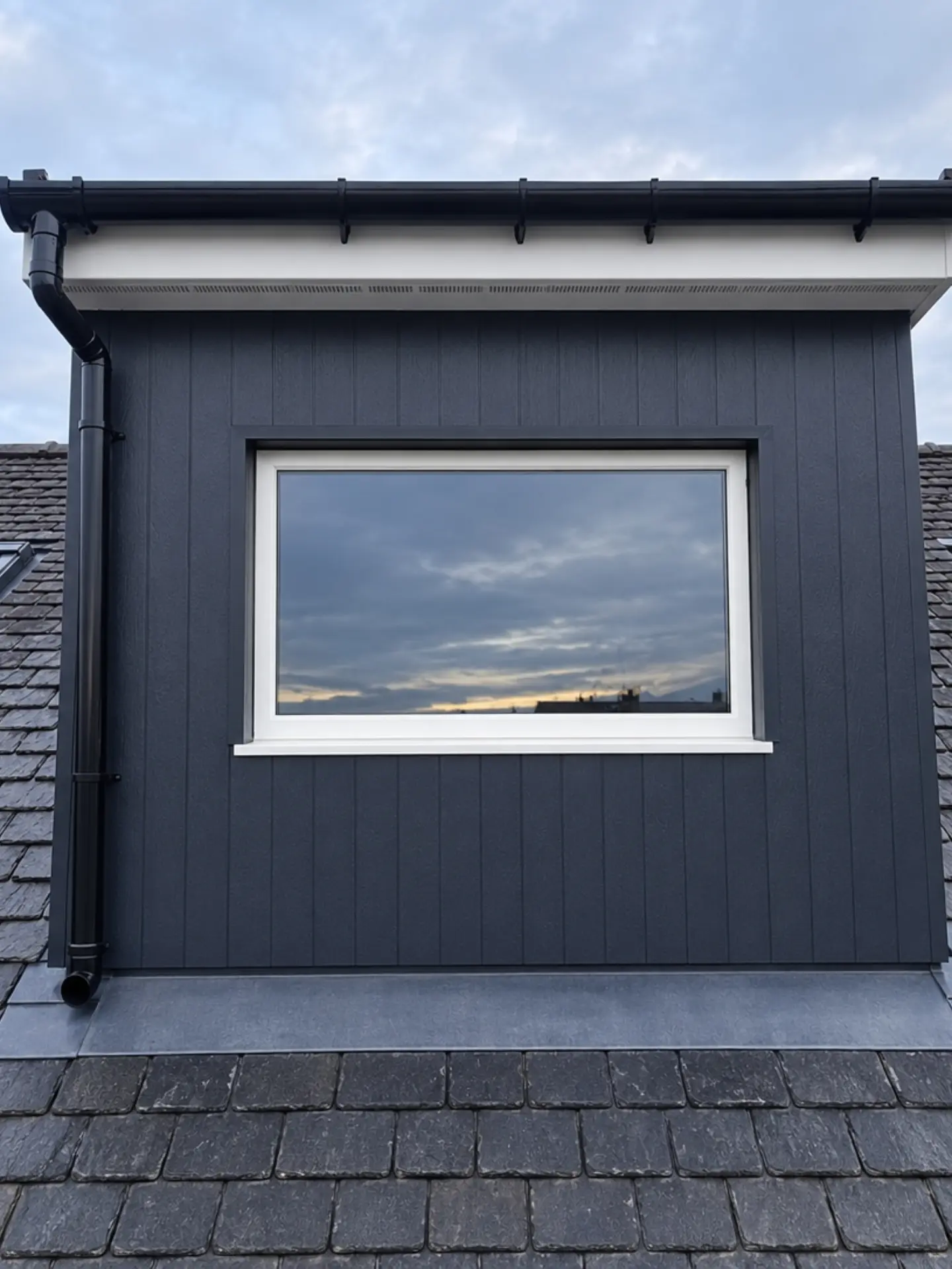 Loft conversion with a dormer, adding two bedrooms