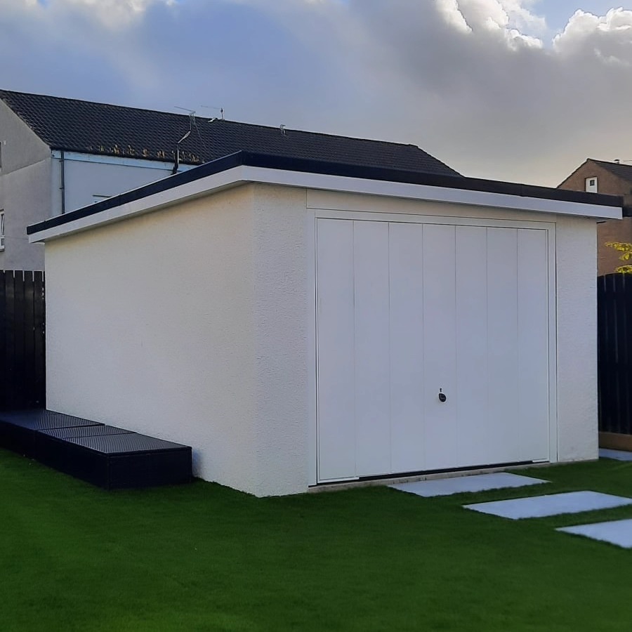 Garage with a new roof and a new door