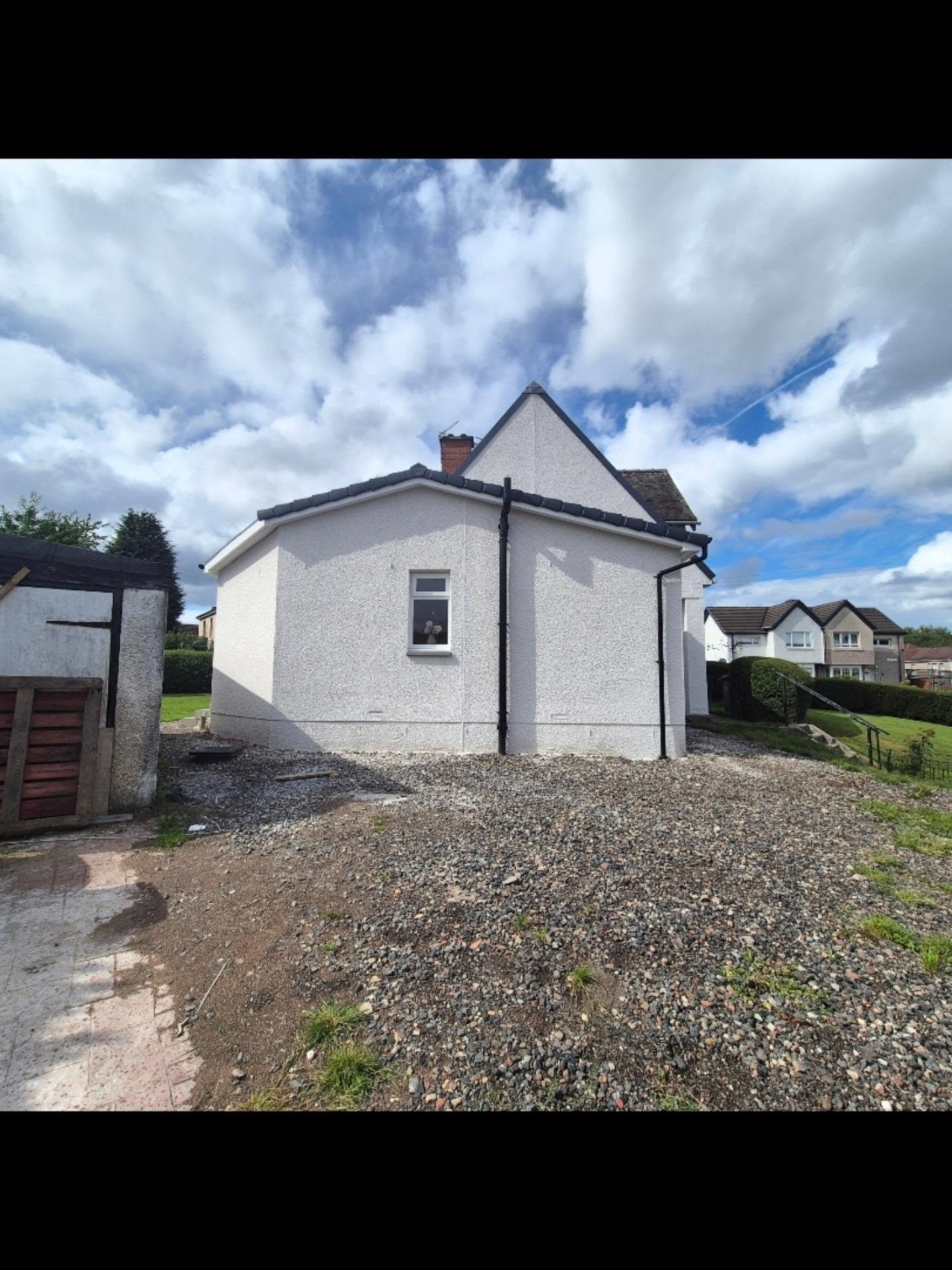 Wrap-around side and rear extension with a bathroom, kitchen, bedroom and living room